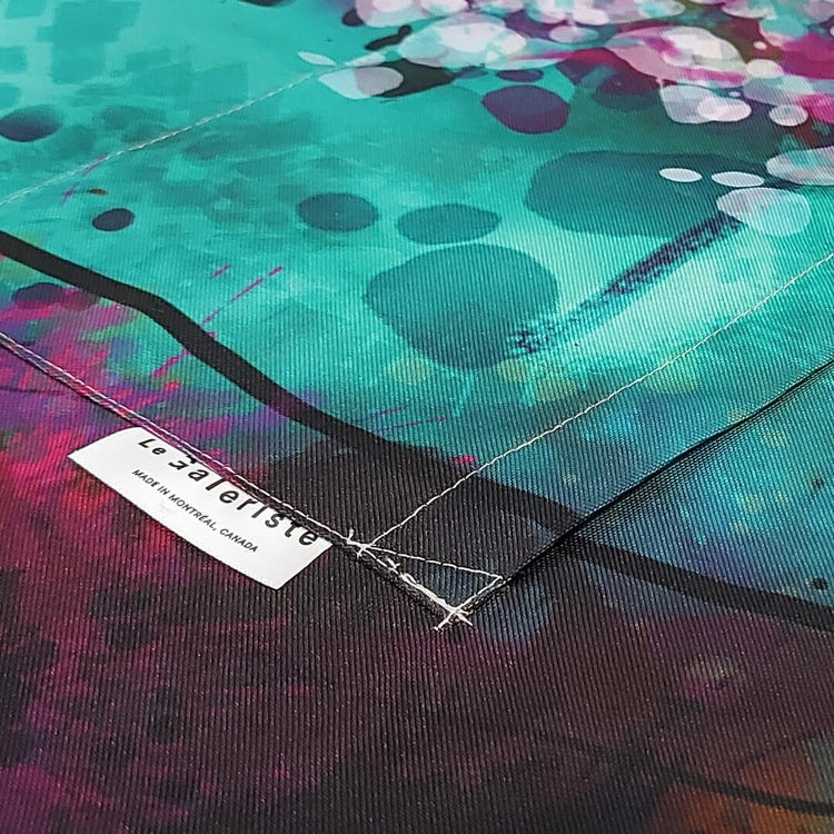 Close-up of vibrant Neuro-Spicy Brain fabric with colorful abstract patterns and a visible Le Galeriste tag.