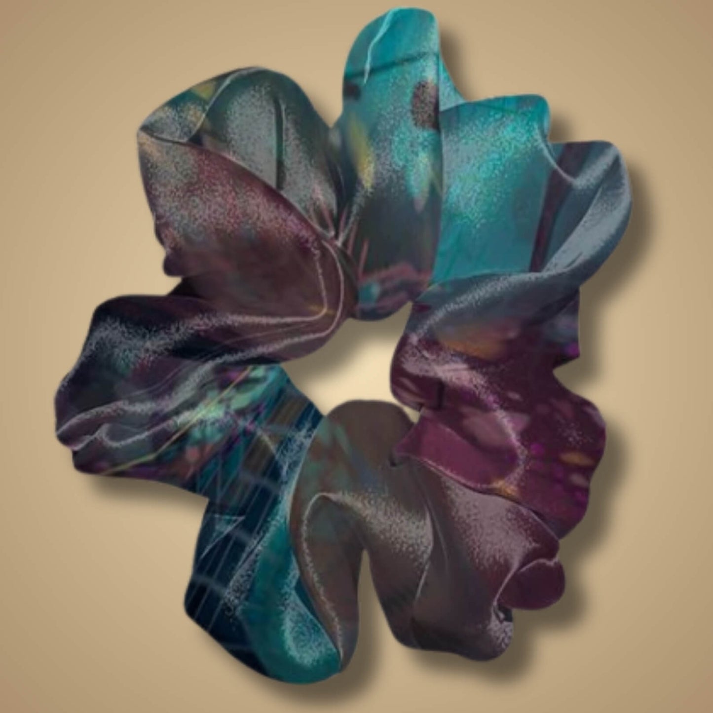 Closeup of the Brain Fog scrunchie highlighting the subtle grey and blue swirls and the smooth, silky texture.