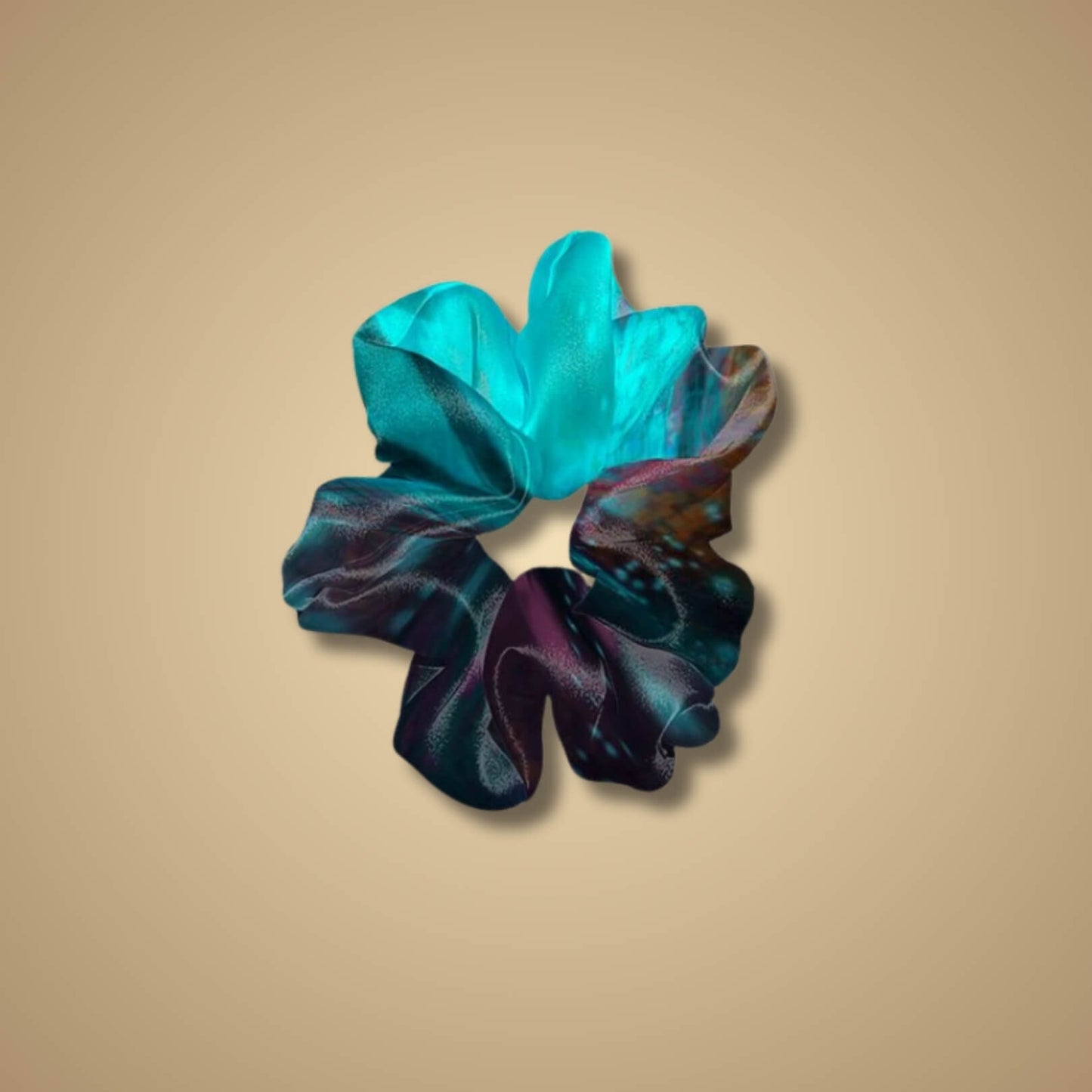 Juliette Jumbo Scrunchie in the Sensory Overload design—dynamic, high-contrast colors with energetic patterns, reflecting the feeling of sensory intensity