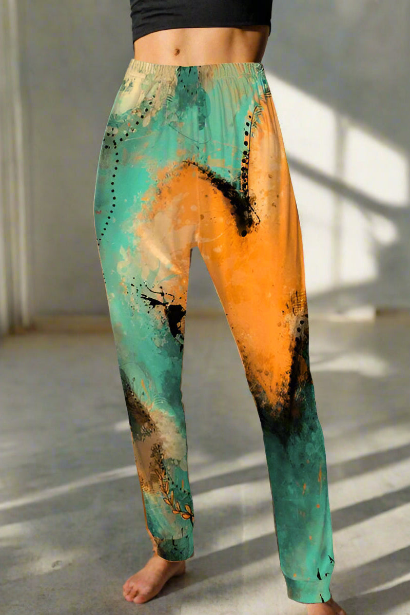 Colorful abstract-patterned pants on a light gray background