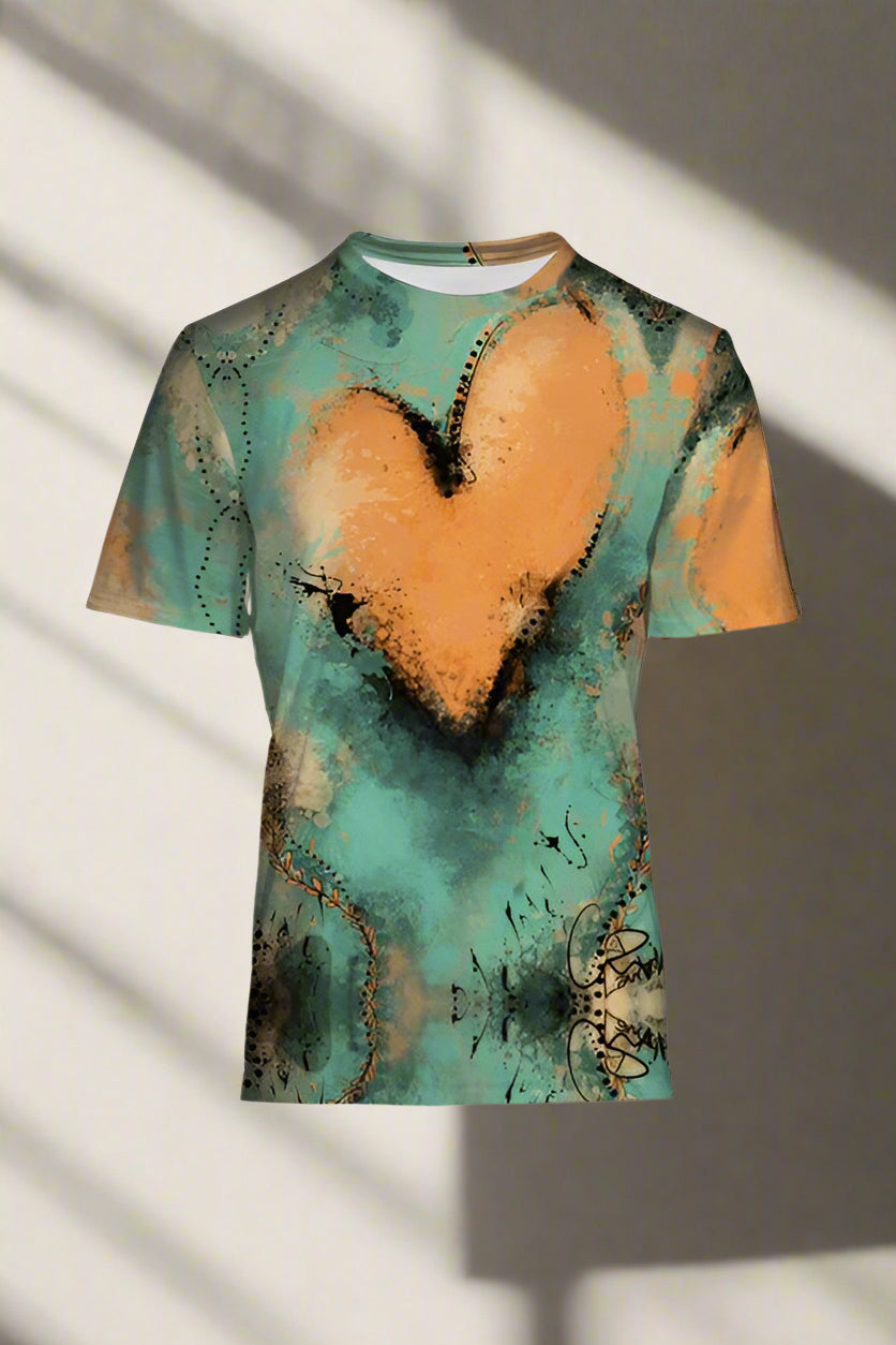 T-shirt with a large orange heart design on a teal background