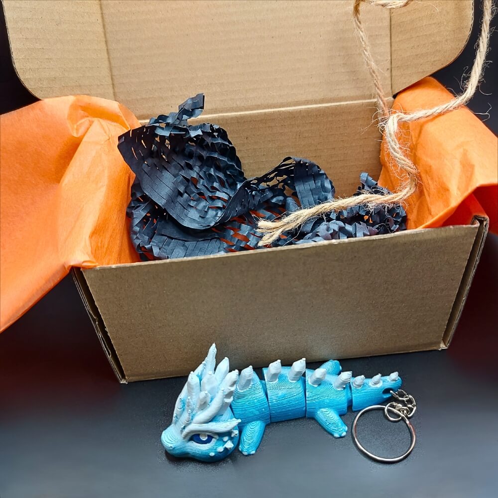 Eco-friendly packaging for Eryndra Ice Dragon featuring KCT branded box