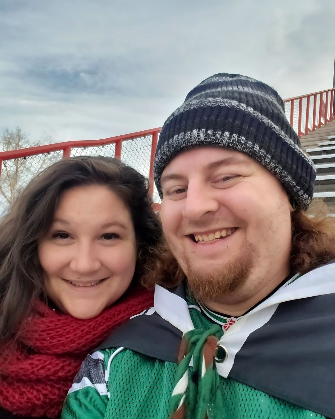 Kyle and Carolyne attending a CFL football game, sharing a fun and energetic behind-the-scenes moment from life outside the KCT studio.