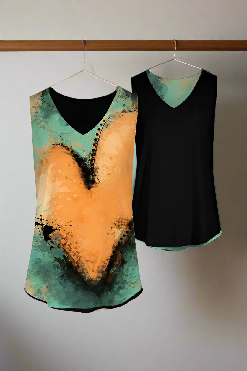 Two sleeveless tops with abstract heart designs on a light gray background