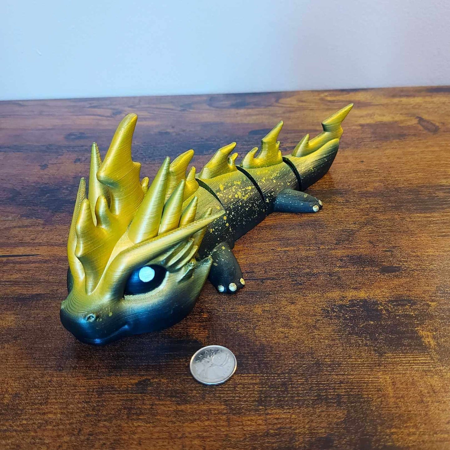 Large Zoryn the Thunder Elemental Dragon of Drakora, 3D-printed and hand-painted by Kylyne’s Custom Treasures, displayed on a wood background with a coin for scale.