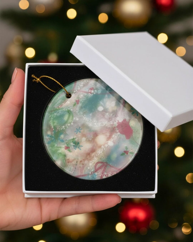 Mademoiselle Winter’s Dance ornament by Kylyne’s Custom Treasures and Le Galeriste, round with abstract winter design, displayed in a gift box for holiday gifting.