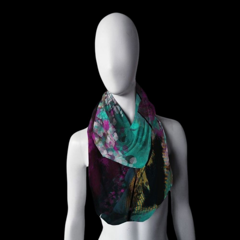 Neuro-Spicy Brain infinity scarf modeled on a mannequin, featuring artistic abstract design in teal, black, and gold by Kylyne’s Custom Treasures