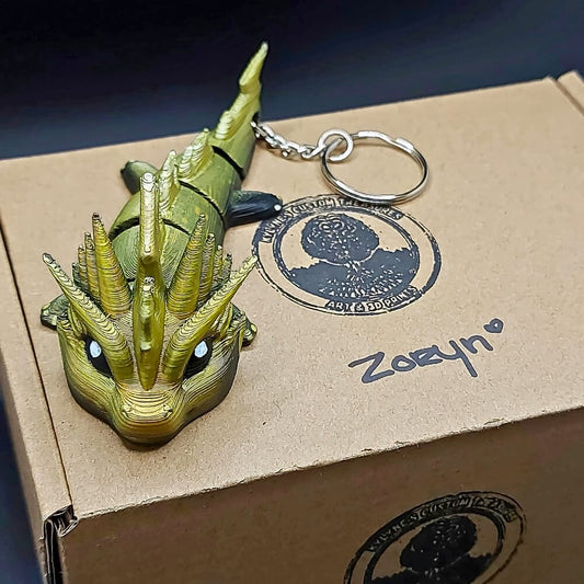 Zoryn Thunder Dragon keychain with eco-friendly packaging and presentation box