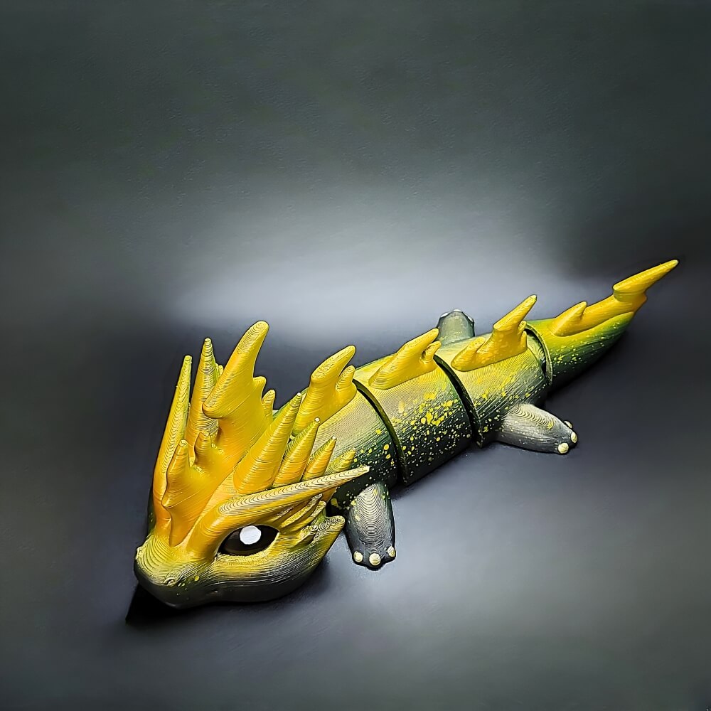 Top view of Zoryn Thunder Dragon keychain displaying lightning pattern details